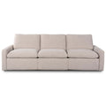 Sofa tapicerowana o harmonijnych proporcjach z naturalnym charakterem w odcieniu bieli