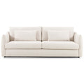 Sofa tapicerowana o harmonijnych proporcjach z harmonijnym wykonczeniem w odcieniu bieli