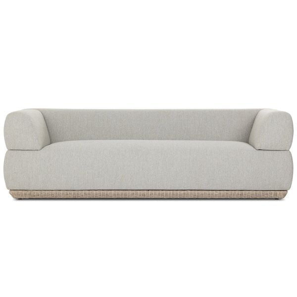 Sofa tapicerowana o ponadczasowym wygladzie z harmonijnym wykonczeniem w odcieniu bieli