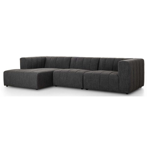 Sofa narozna o nowoczesnym konturze z harmonijnym wykonczeniem w odcieniu czerni