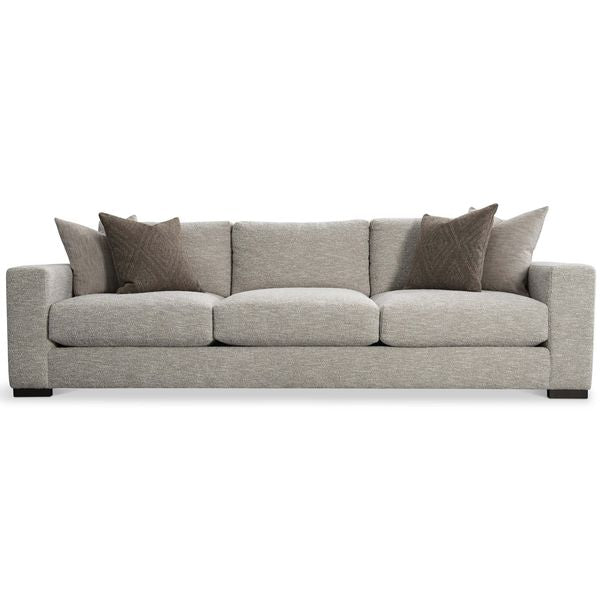 Sofa tapicerowana o ponadczasowym wygladzie z dopracowana sylwetka w odcieniu szarosci